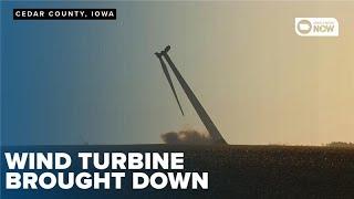 WATCH: Damaged wind turbine brought down with explosives in Eastern Iowa