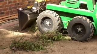 Kanga Mini Loader Hire Turf Preparation, cut and fill Level to drain Back Yard.