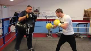 ANTHONY UPTON UNLEASHES THE COMBOS  ON THE PADS WITH TRAINER BARRY SMITH