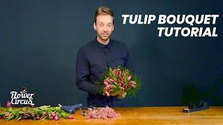 Tulip Bouquet with gloriosa, greens, and pepper berries by Michael van Namen 