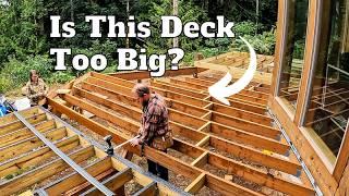 INSTALLING THE JOISTS on our 900 sq. ft. DECK