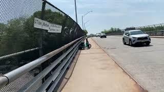 Walking across the Wakefield Avenue Bridge