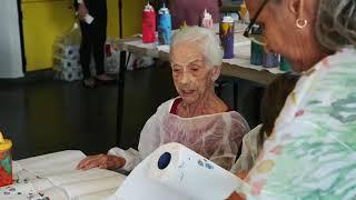 Neil Kerman Painting with Residents at Vila Mariana in Sao Brazil 2019