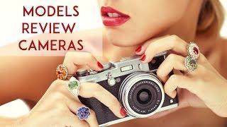 Review famous professional cameras. Fashion models learn how to use the camera