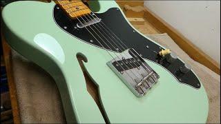 A Strat, then a Thinline Tele