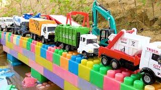 Trucks falls into water and is rescue by crane trucks | BIBO TOYS