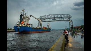 An Electrifying Arrival! The BBC Challenger coming into Duluth with a little lighting storm action!