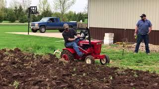 Plowing with a Wheel Horse Raider 12