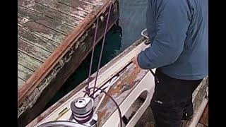 SINGLEHANDED; LEAVING THE DOCK USING THE "MOITESSIER STERN TIE" -- DOCK VIEW