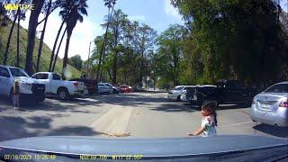 Little Girl Runs Between Parked Cars & Almost Gets Run Over