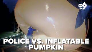 Ohio police officer battles runaway pumpkin inflatable