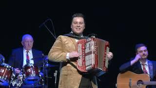 Flying fingers of Brandon McPhee playing The Flying Scotsman on button accordion in Aberdeen 2024