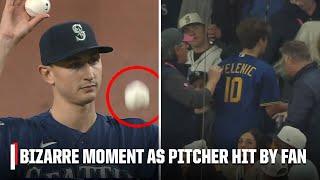 Fan removed after nearly striking George Kirby with ball in Seattle | MLB on ESPN