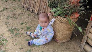 Single mother - Taking her child to pick medicinal herbs to sell