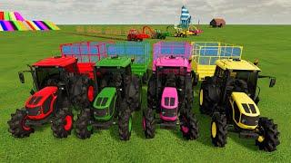 Multicolored Mahindra Tractors and Trailers on Platforms - Test New Vehicles on the Farm