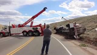 Tow Truck Crew recover Rolled Cement Truck