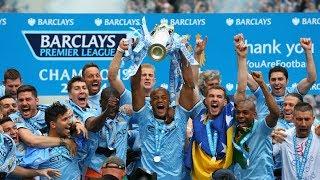 Manchester City lift the Premier League trophy after being crowned champions