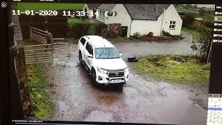 Woman hilariously struggles to shut windblown gates during storm.