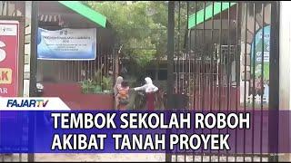 TEMBOK SEKOLAH ROBOH AKIBAT TIMBUNAN TANAH PROYEK