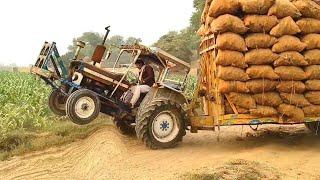 Ford Tractor stunt | Ford Tractor spend full power pulling loaded Trolley | powerful Ford Tractor