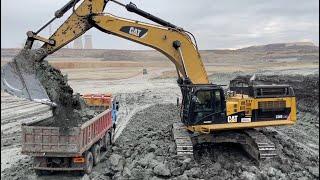 Caterpillar 374D Excavator Loading 4-Axle Trucks at a Massive Mining Site – 4K – Interkat SA