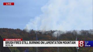 Fire crews continue to battle large brush fire in Berlin