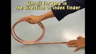 Unroll and straighten copper tube