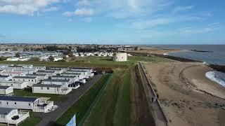 Martello Tower beach St OSYTH . by drone footage uk