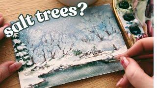 Watercolor snowy trees using salt and painting a spontaneous snowy landscape