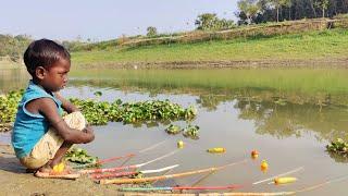 Asian Traditional Smart boy Catching Fish By Hook In The Village River Water ~ Fish King Bd