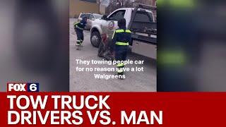 Confrontation between tow truck drivers, man | FOX6 News Milwaukee