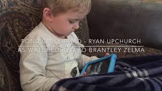 3yo watching Pond Creek Road by Ryan Upchurch