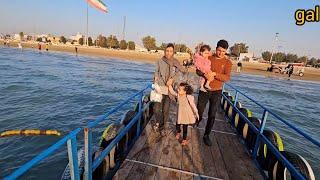 Business trip or adventure?  Mehran and his family next to the sea waves