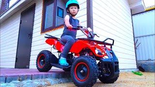 Senya and unpacking an ATV for children