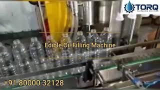 AUTOMATIC EDIBLE OIL FILLING MACHINE