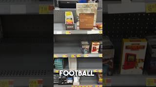 Opening a pack of football cards from Walmart