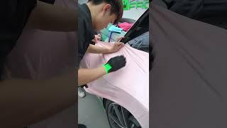 The process of wrapping this Porsche 911 in piggy pink! Good job!