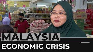 Malaysian PM tightens spending in first budget