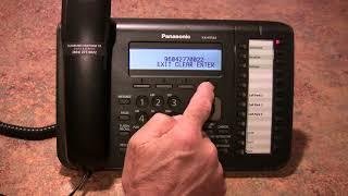 How to program a button on a Panasonic KX-DT543