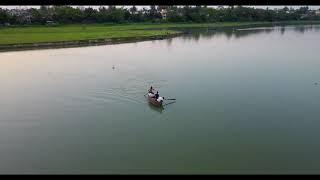 Drone Shot of Fishermen in Rowboat