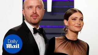 Aaron Paul and Lauren Parsekian arrive at Vanity Fair party