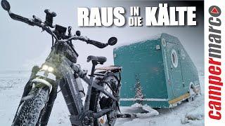 Winter tour in snowfall with the bicycle caravan