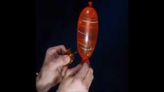 Zero-G Water Balloon Pops in Slow Motion