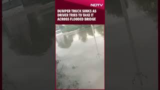 UP Rain | Dumper Truck Sinks As Driver Tries To Take It Across Flooded Bridge  In UP