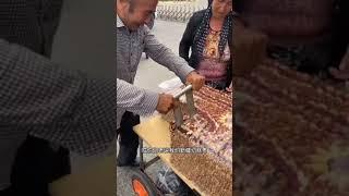 Famous Chinese street food in Xinjiang - Yummy Uyghur qiegao / cut cake with fruits and nuts 新疆切糕