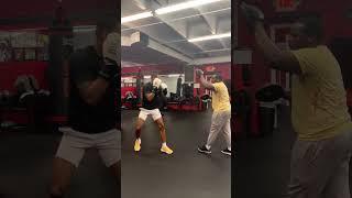 Greg Hackett working with my son as he begins his boxing journey! Philly 