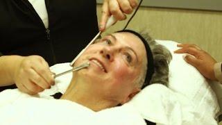 Microcurrent facial giving faces a workout