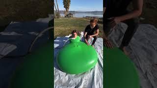 We fit a person inside of this MASSIVE Water balloon!#shorts