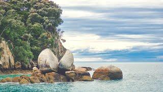 Kayaking in the pristine waters of Abel Tasman National Park, New Zealand