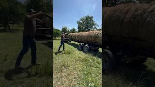Unloading 9,000 lbs of hay in less than 20 seconds! #ranch #farmequipment #bale #haytrailer #fast